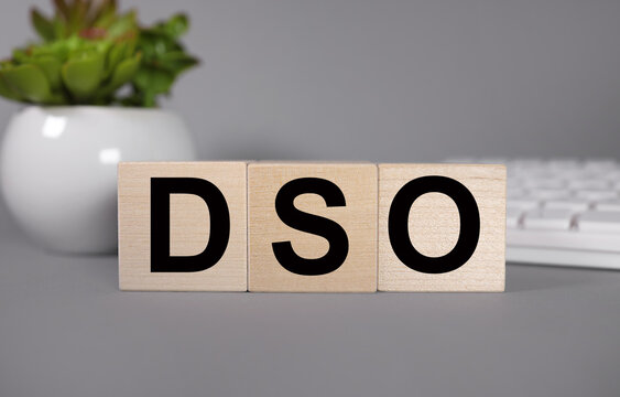 DSO - Days Sales Outstanding acronym, business concept .text in black letters on wood blocks