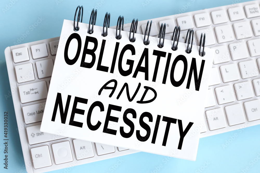 Poster obligation and necessity. text on white notepad paper on white keyboard