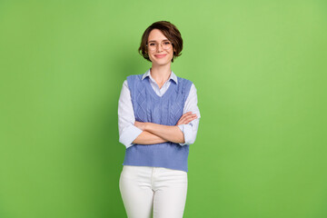 Photo portrait of young confident business woman in glasses smiling folded hands isolated vivid...