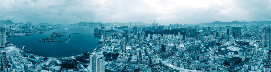 Fototapeta na wymiar Panorama view of Hong Kong city in blue color tone