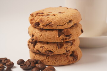 Delicious homemade vanilla flavor cookies with chocolate chips on white background
