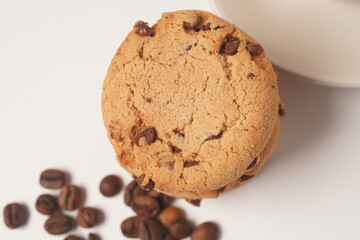 Delicious homemade vanilla flavor cookies with chocolate chips on white background