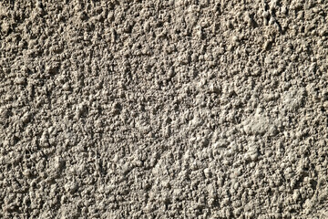 Concrete plaster wall background. View from the front. UNUSUAL SURFACE.