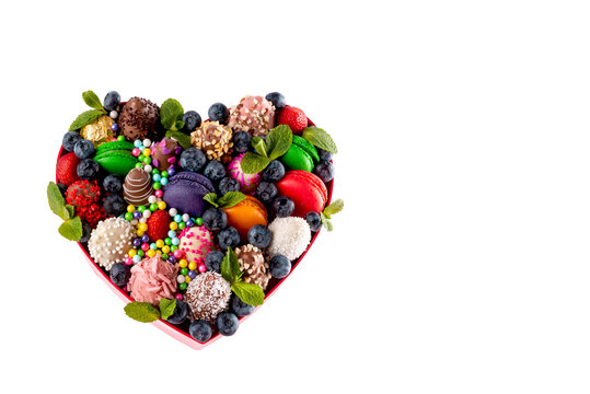 Variety Of Chocolate Dipped Strawberries In A Heart-shaped Box.