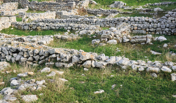 remains of ancient walls on the site of a destroyed antique city