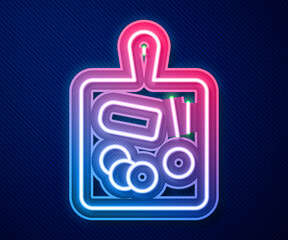 Glowing neon line Cutting board icon isolated on blue background. Chopping Board symbol. Vector.