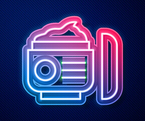 Glowing neon line Cream or lotion cosmetic tube icon isolated on blue background. Body care products for woman. Vector.