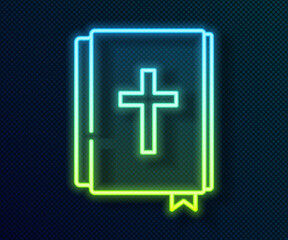 Fototapeta premium Glowing neon line Holy bible book icon isolated on black background. Vector.