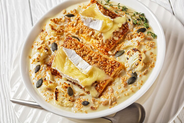 creamy vegan cauliflower soup in a bowl