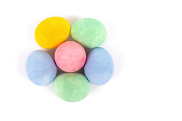 Colorful Easter flower shaped eggs isolated on white background