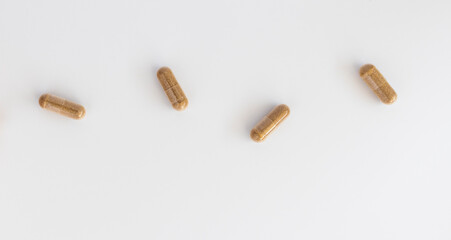 close-up of ginkgo biloba extract capsules on a white background. dietary concept. dietary supplement topview