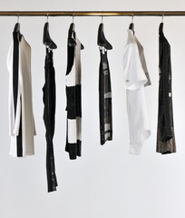Elegant and trendy women's clothes hanging