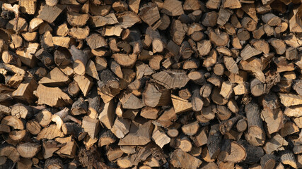 texture of chopped firewood. woodpile with firewood