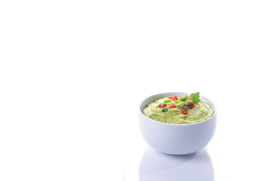 Guacamole Bowl Isolated On White Background With Copy Space.