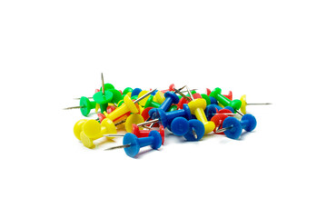 Push pins on white background