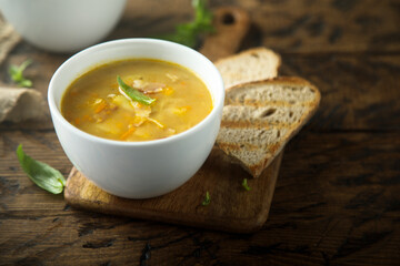 Homemade pea soup with smoked bacon