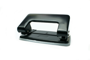 Office paper perforator on white background