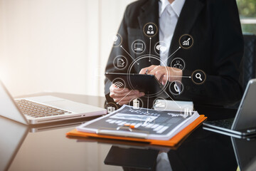 Women hand holding laptop, tablet  for online shopping .Online shopping concept.