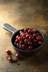 Fresh gooseberry in a white cup