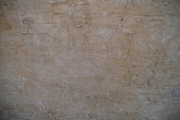 concrete wall background. White and brown putty wall close-up. building construction exterior. Copy...