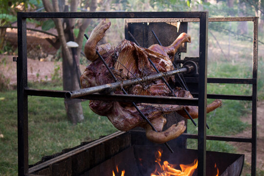 Pork barbecue on the roll. Traditional Brazilian whole pork barbecue. Gourmet photography.