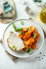 Roasted pork with carrot and basil
