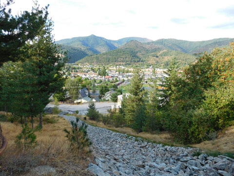 A rocky artificial riverbed leads to the north side of Kellogg, Idaho. Fed by melting snow in the spring, it is currently dry during Summer.