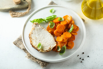 Roasted pork with carrot and basil