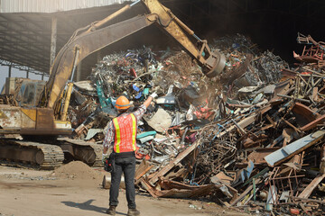 Recycling industry a worker who recycling thing on recycle center.Manager and Manual Worker in...