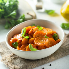 Healthy roasted carrot with fresh basil