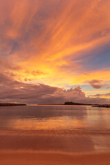 Beautiful ,autumn, sunrise ,over Newcastle Harbour. Nobbys Lighthouse in the distance. Hunter Region of N.S.W. Australia.