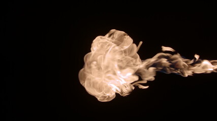 Slow-motion video of fire and flames. A fire pit, burning gas or gasoline burns with fire and flames. A hellish glow of fire in the dark with copy space