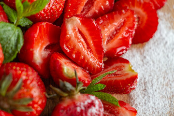 Appetizing juicy bright strawberries, sprinkled with powdered sugar - vitamin composition, the taste of summer
