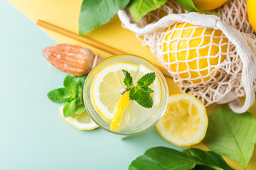 Hard seltzer cocktail with lemon and zero waste bartenders accessories