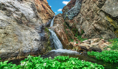 Beautiful landscape of a small waterfall in Garrapata State Park, on the hiking trails of Point Soberanes, California, USA