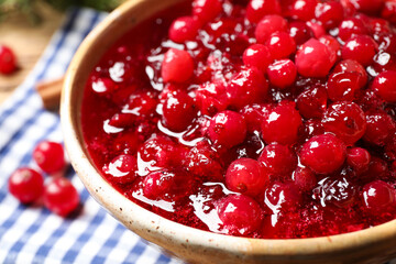Fresh cranberry sauce served in bowl, closeup