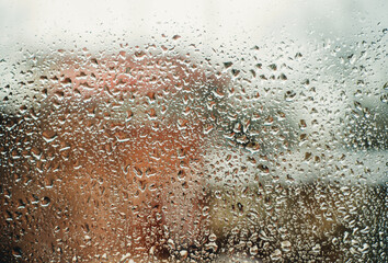 raindrops on glass and street view