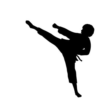 Silhouette child athlete training martial art.