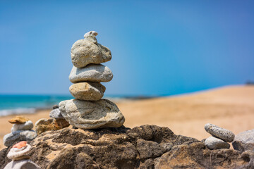 Balanced stones on the beach
