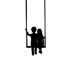 Silhouettes of children boy and girl on swing