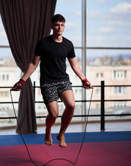 Kickboxer jumping rope