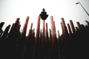 Man balancing on a pole