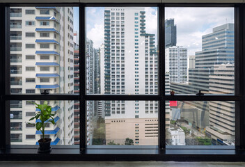 Interior of window office and crowded building in downtown