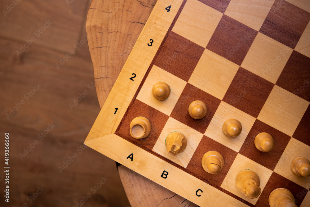 Wall mural Chess board on a table