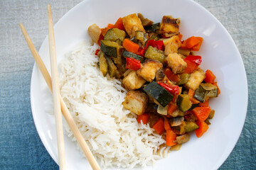 vegetable asian meal tofu and vegetables stir fried with white rice