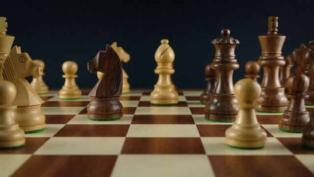 Knight Is Moved By Hand On Chess Board Tracking Shot