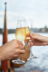 couple having amazing lunch and drink champagne at outdoor restaurant