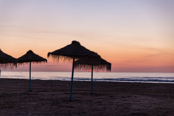 sunrise with beautiful colors at malvarosa beach of the City of valencia, costa blanca, spain