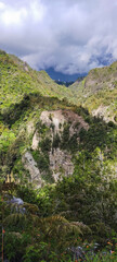Fototapeta na wymiar Volcanic Landscapes of Reunion Island at clouds altitude