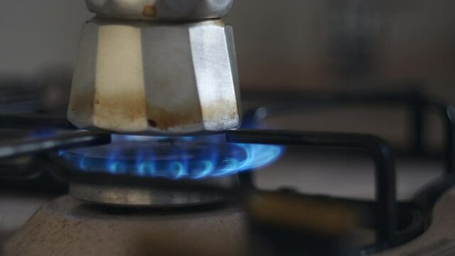 making espresso coffe on a gas stove